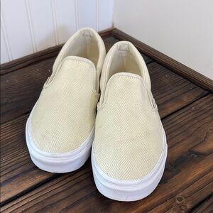 Vans Cream Slip-On Sneakers